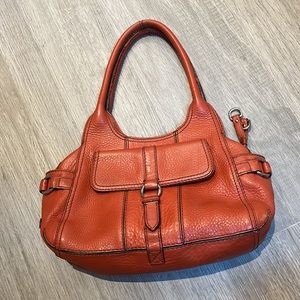 Small orange Cole Haan handbag